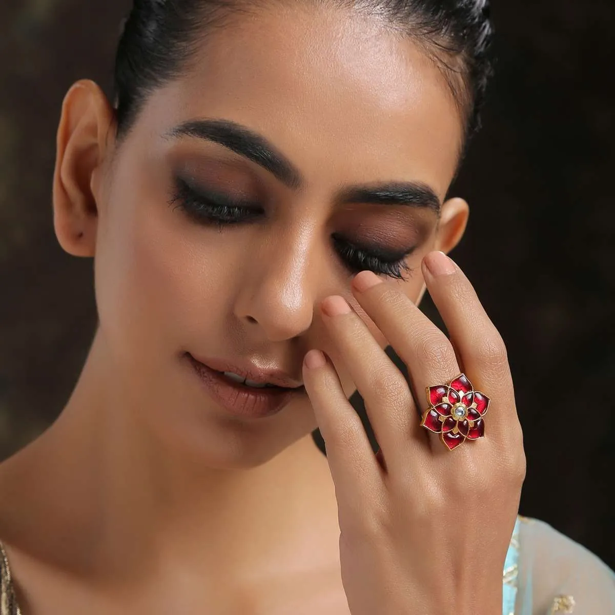 Gold Plated Cocktail Ring With Ruby Red Stones And Kundan Arranged In A Flower Shape By Paisley Pop